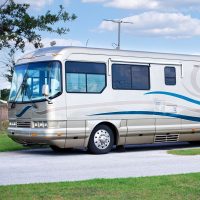 Beautiful, luxury motor home parked in a national park campground.